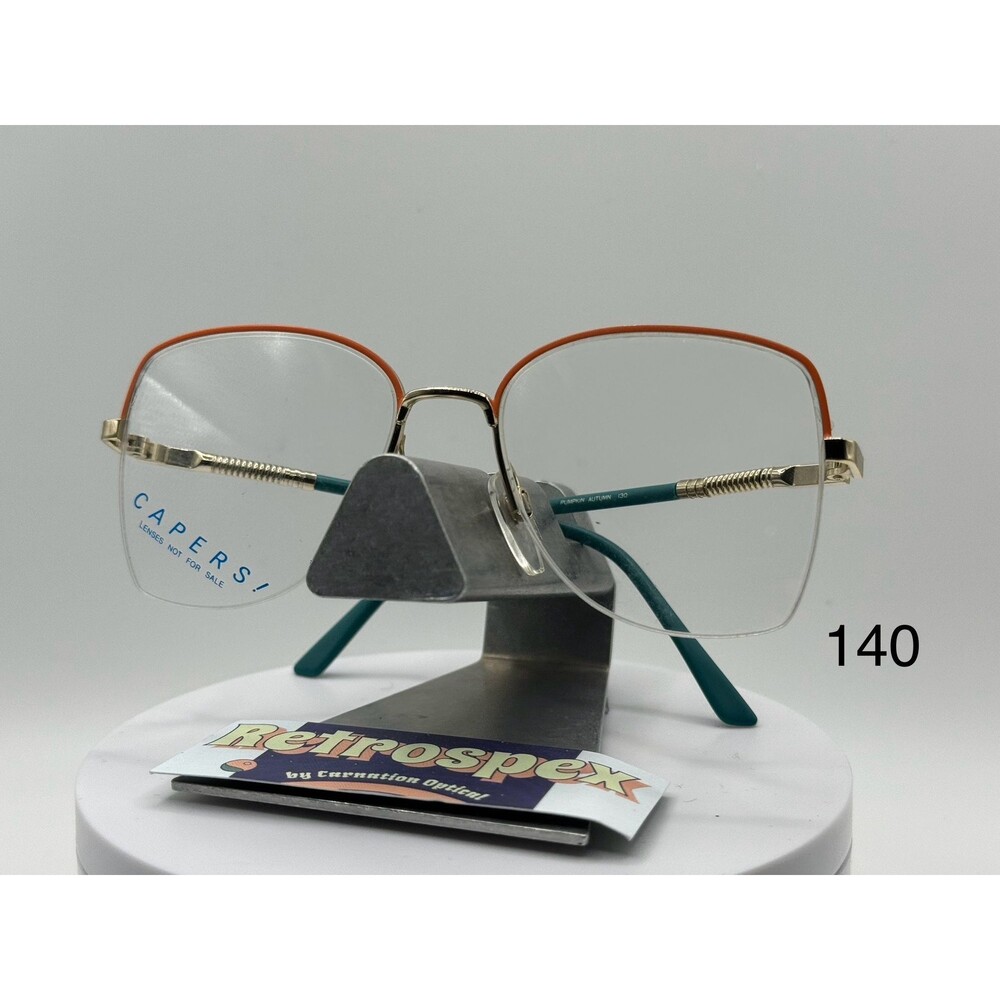 True Vintage Eyeglasses NOS Small Rimless Original Demo Lens Capers 918 Pumpkin